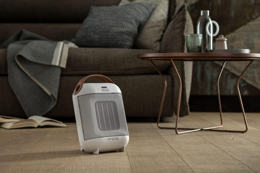 De'Longhi Capsule Fan Heater | Self-Regulating Ceramic Heater| Mini Fan Heater | Portable Heater with Handles | Desk Heater |1800W