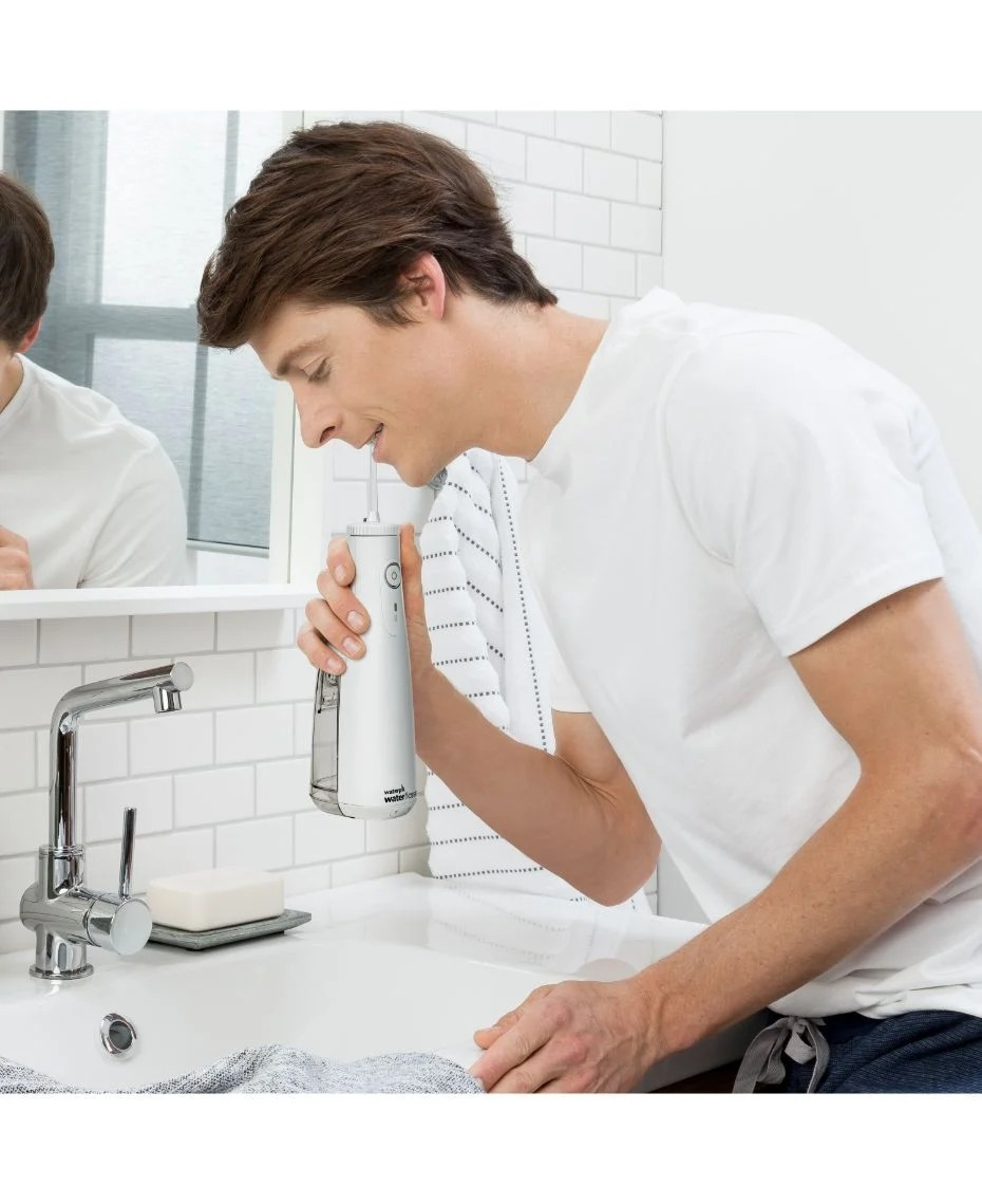 Waterpik Cordless Select Water Flosser | White | Pressure Floss | Lightweight | Rechargeable